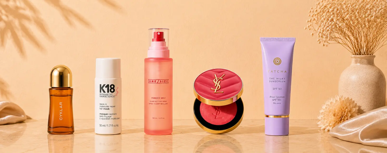 Authentic luxury beauty products styled on soft neutral linen
